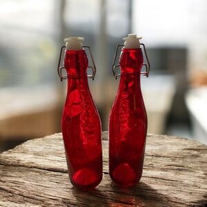 Set of Two Red Glass Bottles with Swing Top